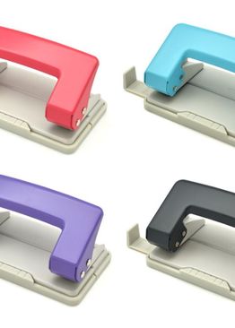 PAPER HOLE PUNCH WITH ADJUSTABLE PAPER GUIDE